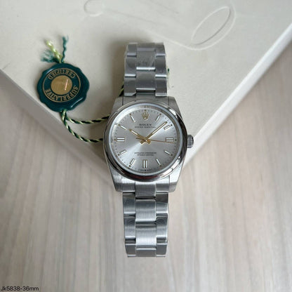 ROLEX OYSTER PERPETUAL PRATA FEMININO 36MM