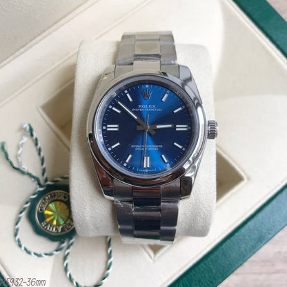 ROLEX OYSTER PERPETUAL PRATA AZUL FEMININO 36MM