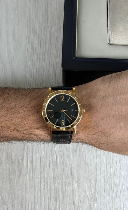 BVLGARI ROMA DOURADO PRETO COURO AUTOMATICO 38MM