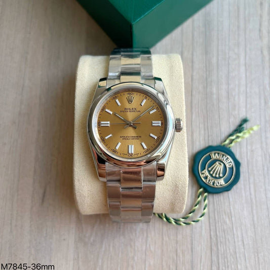 ROLEX OYSTER PERPETUAL PRATA AMARELO FEMININO 36MM
