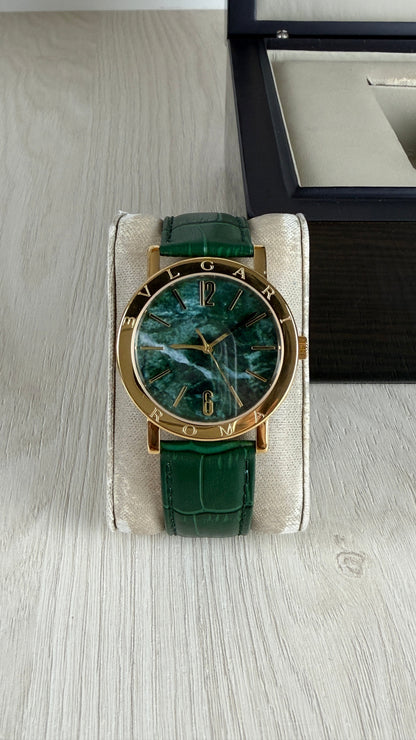 BVLGARI ROMA DOURADO VERDE COURO AUTOMATICO 38MM